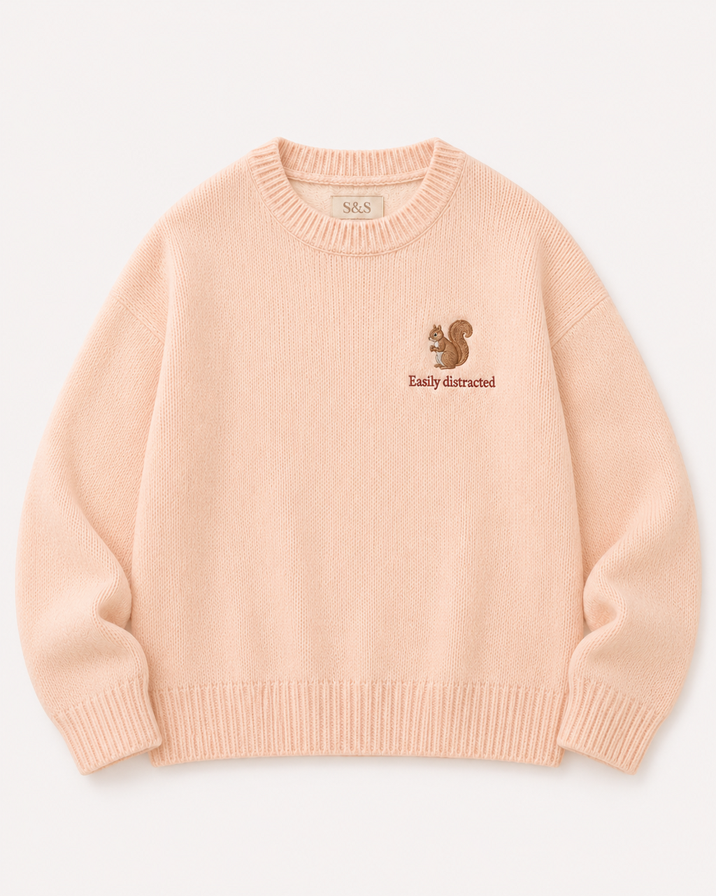 Sofia & Sterling Easily Distracted peach solid knit jumper